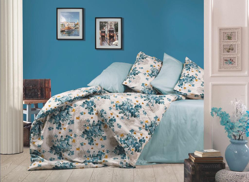 Turquoise floral bed linen set with a light blue sheet