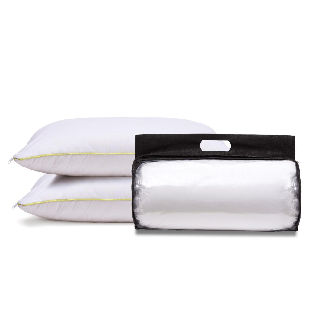 White quilted pillows and a transparent carry bag